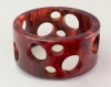 BB259 cherry amber swiss cheese bangle